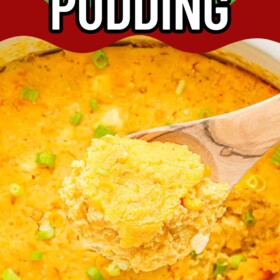 Sweet and savory crockpot corn pudding in a slow cooker with a wooden spoon scooping out a serving.
