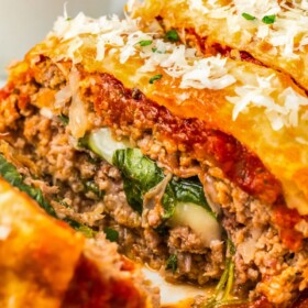 Stuffed meatloaf with cheese, prosciutto and spinach.