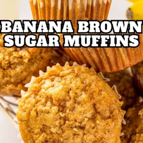 Brown sugar banana muffins stacked in a basket and a muffin with glistening brown sugar on top.