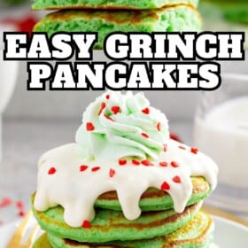 Fluffy green grinch pancakes on a plate with cream cheese frosting, green whipped cream and red heart sprinkles on top.