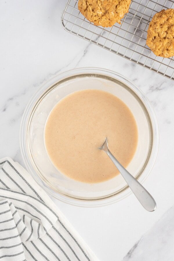 Cinnamon sugar icing is in a glass bowl.