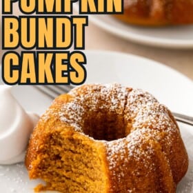 A bitten pumpkin spice bundt cake on a white plate.