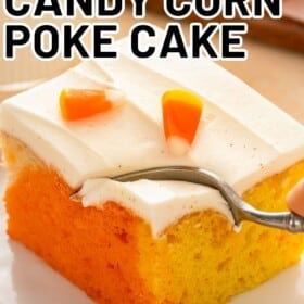 A fork is pushing into a slice of homemade candy corn cake.