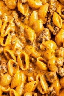 Up close view of cheeseburger pasta with tender pasta shells and ground beef in a cheesy cream sauce.