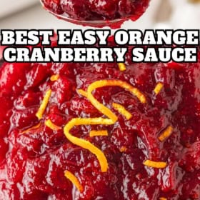 Cranberry orange sauce in a bowl and being lifted with a serving spoon.