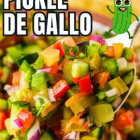 Quick and easy pickle de gallo is being lifted from the bowl with a large serving spoon.