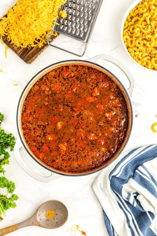 Ingredients for goulash are simmering in a pot.