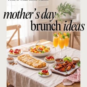 A sunlit table set for Mother’s Day brunch features fruit salad, pastries, wings, dessert cups, nuts, and four glasses of orange juice, with the text: “forget the flowers. THIS is what mom wants. mother’s day brunch ideas.”.