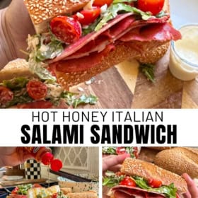 A hand holds a Hot Honey Italian Salami Sandwich filled with salami, tomatoes, lettuce, and dressing. Additional sandwich halves and ingredients are shown on a cutting board.