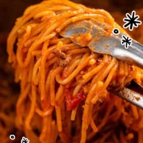 A close-up of tongs lifting spaghetti with meat sauce from an Instant Pot. Text reads: Instant Pot Spaghetti. Quick and easy ground beef dinner. The Novice Chef..