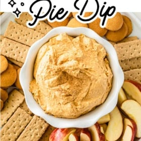 A white bowl of sweet potato pie dip is surrounded by sliced apples, graham crackers, and vanilla wafers on a white platter. The text reads Sweet Potato Pie Dip and thenovicechef.com at the bottom.